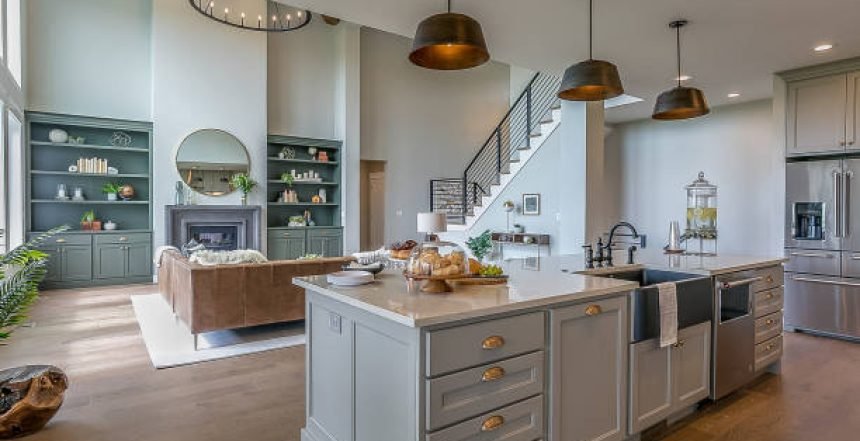 Kitchen island with gray and white colors staged for Tour